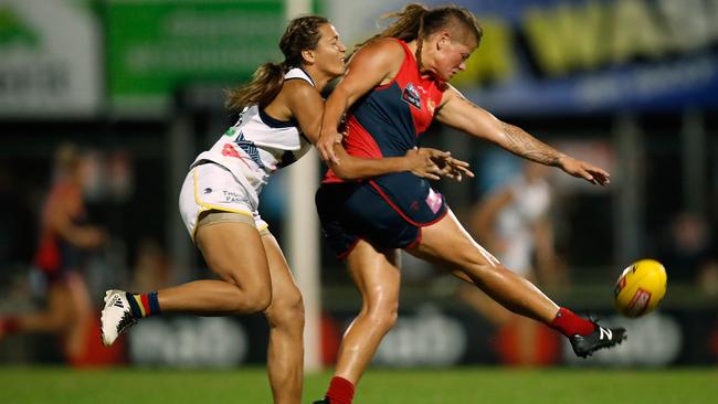 Tayla Thorn of the Crows tackles Richelle Cranston of the Demons during the 2017 AFLW Round 6 match in Darwin. Photo: Michael Willson/AFL Media/Getty Images