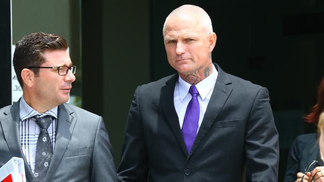 Michael Gatenby leaving court with alleged Mongols president Nick “the Knife” Forbes. Picture: David Clark