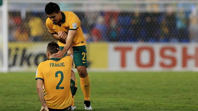 Australia's Massimo Luongo celebrates Australia's 2-0 win with team mate Ivan Franjic during the Asian Cup semi final between Australia and United Arab Emirates (UAE) at Hunter Stadium in Newcastle. Picture: Toby Zerna