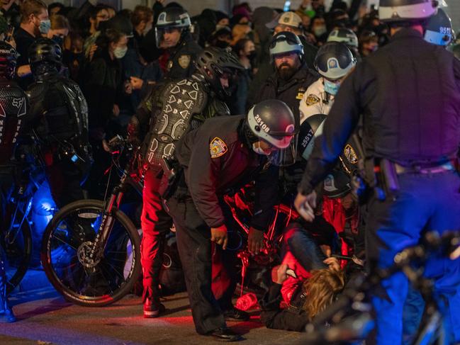 Protesters are arrested while taking to the streets as results of the presidential election remain uncertain in New York City. Picture: AFP