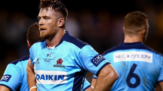 Jack Dempsey of the Waratahs watches on after a Chiefs try during the Round 6 Super Rugby match between the NSW Waratahs and the Waikato Chiefs at WIN Stadium in Wollongong, Friday, March 6, 2020. (AAP Image/Mark Nolan) NO ARCHIVING, EDITORIAL USE ONLY