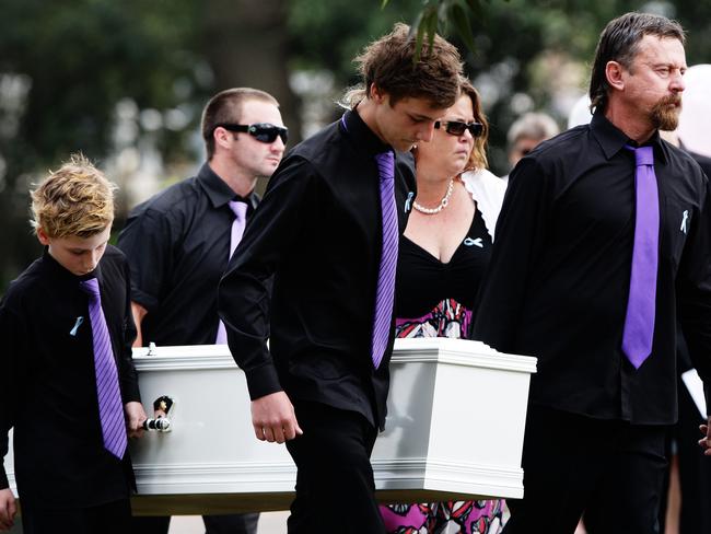 Brothers Blake, Chris and Kyle Rice, along with father John Tyson, helped carry the coffins of Jordan and Donna.
