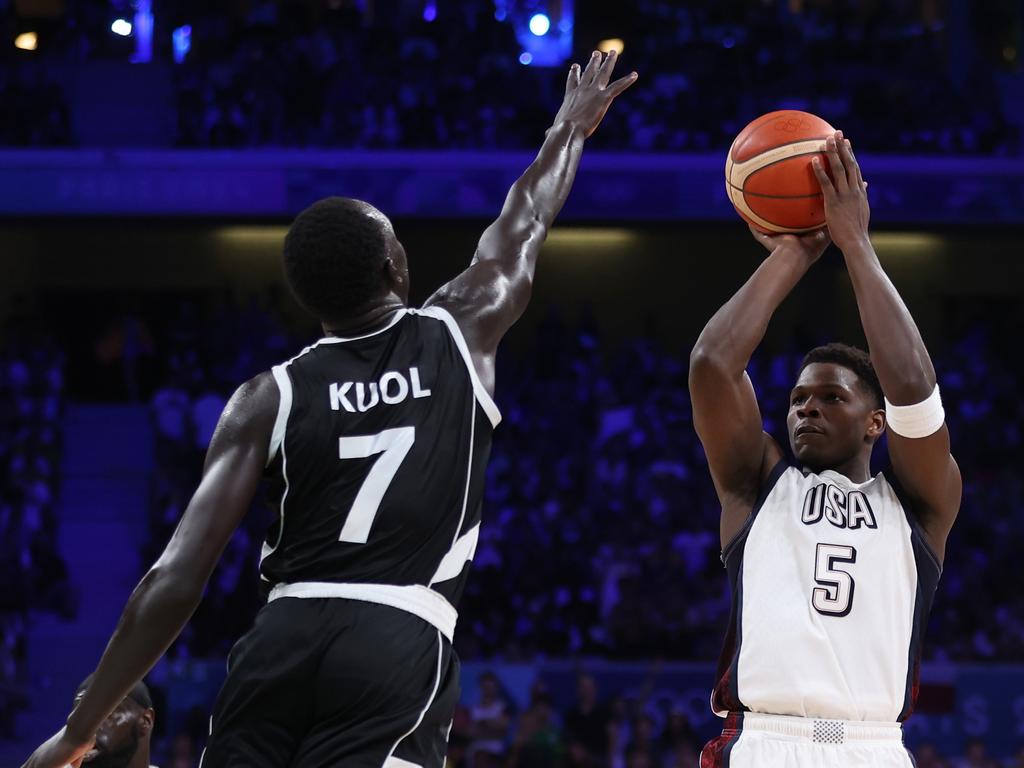 Anthony Edwards shoots over South Sudan star Bul Kuol. Picture: Getty Images