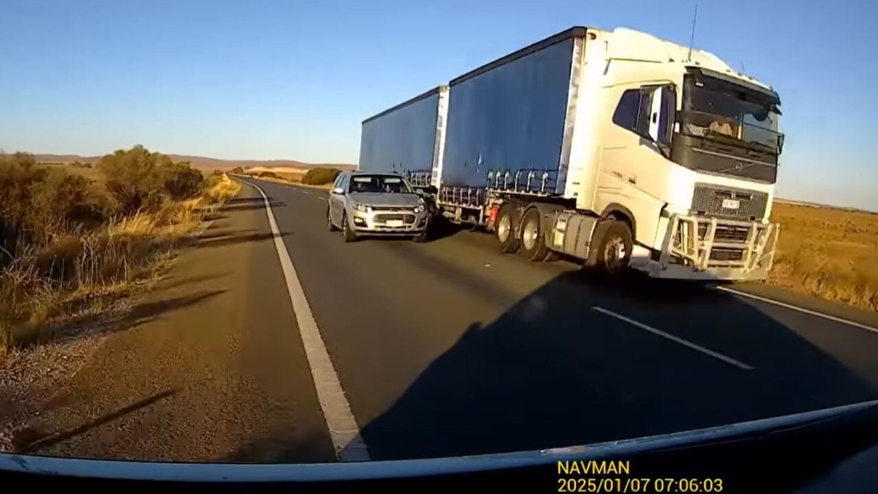 The opposite car is only halfway alongside the truck when it appears Mr Quinn is forced to swerve onto the road shoulder to avoid a crash. Picture: Facebook