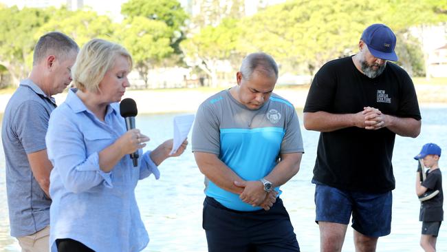 Tom Tate being baptised at Evandale lake during a combined churches service. Paster Sue Baynes and helpers Marshall Gray (black T-shirt) and Rodger Baynes (grey shirt). Picture Mike Batterham