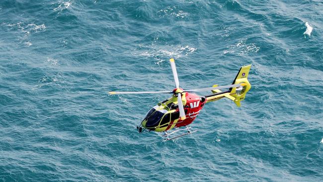 The chopper continues the search. Picture: NIGEL HALLETT