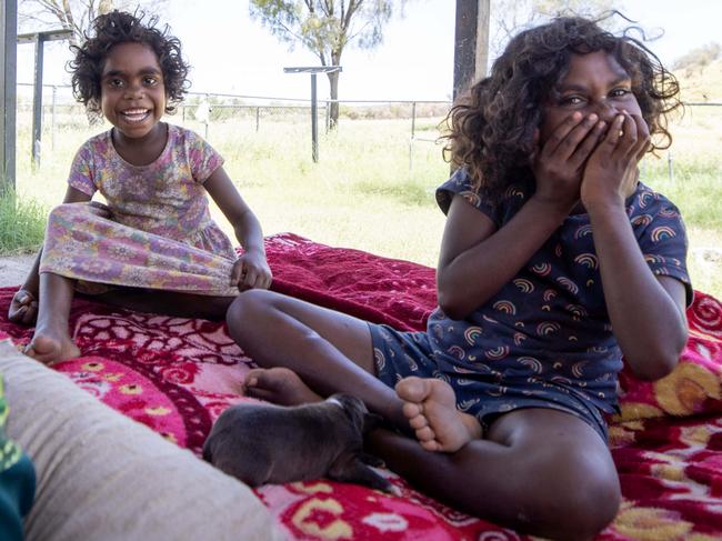 22/01/2023: (L-R) Tilana, aged 5 & Monica, aged 8, pictured at a home in a town camp on the outskirts of Alice Springs. Picture: Liam Mendes / The Australian