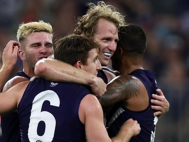 David Mundy of the Dockers celebrates kicking a goal with Reece Conca during the Round 6 AFL match between the Fremantle Dockers and the Western Bulldogs  at Optus Stadium in Perth, Saturday, April 27, 2019.  (AAP Image/Gary Day) NO ARCHIVING, EDITORIAL USE ONLY