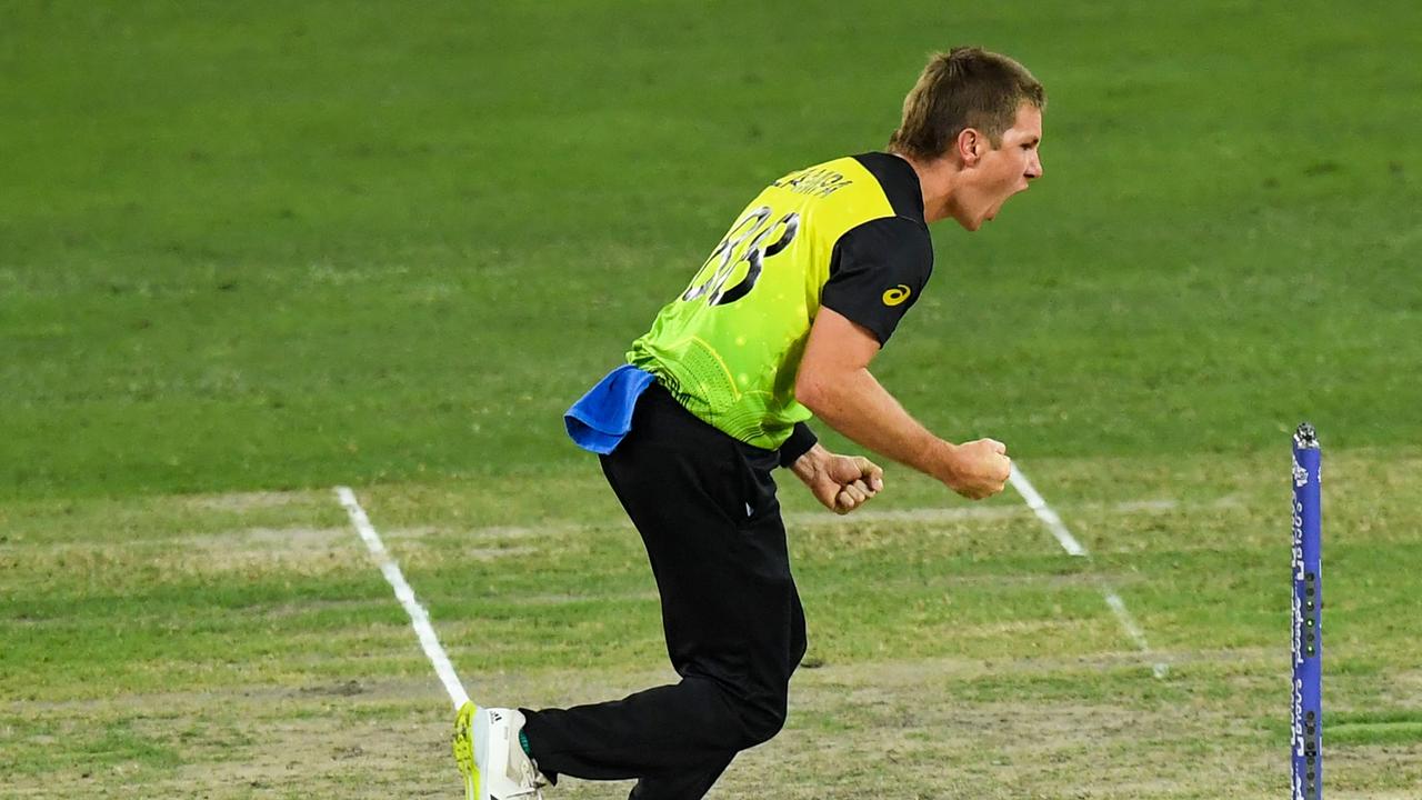 Australia's Adam Zampa celebrates after dismissing Pakistan's captain Babar Azam (not pictured) during the ICC menâ&#128;&#153;s Twenty20 World Cup semi-final match between Australia and Pakistan at the Dubai International Cricket Stadium in Dubai on November 11, 2021. (Photo by INDRANIL MUKHERJEE / AFP)