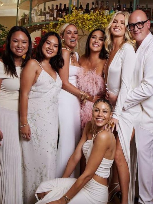 Lou O’Neil rocks pink while her guests wear white.