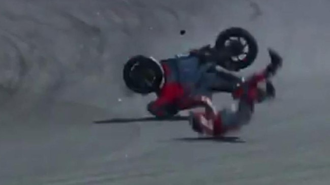 Lorenzo in horror crash off his bike