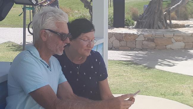 Stephanie Gilmore's parents Jeff and Tracy Gilmore watch her take home her seventh world title win from Kingscliff Surf Club. Photo: Brianna Morris-Grant