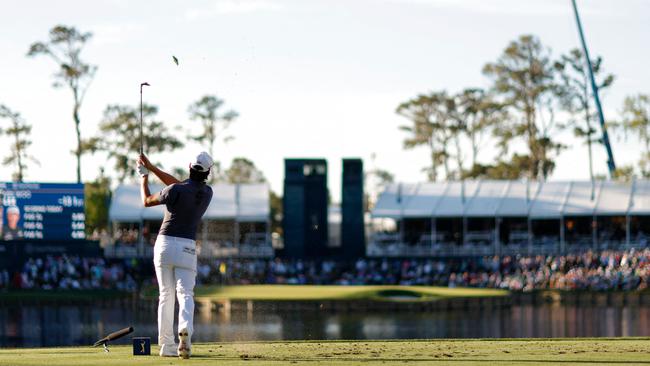 Min Woo Lee of Australia plays his shot from the 17th te Mike Ehrmann/Getty Images/AFP