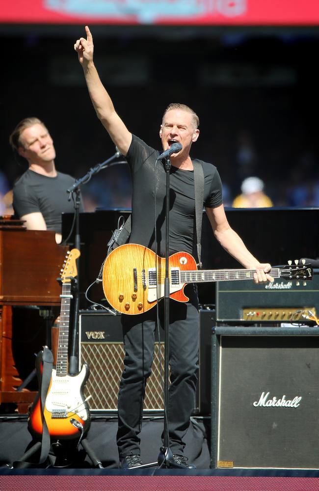 Bryan Adams performing during the pre-game entertainment at the 2015 AFL Grand Final between West Coast and Hawthorn at the MCG. Picture: Alex Coppel.