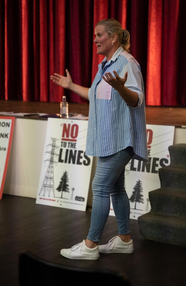 Katy McCallum speaking at Kilkivan Town Hall where more than 100 people gathered after news of Powerlink's selected corridor of a transmission line from Borumba Dam to Woolooga Substation in late April. Wednesday, May 3, 2023. Picture: Christine Schindler