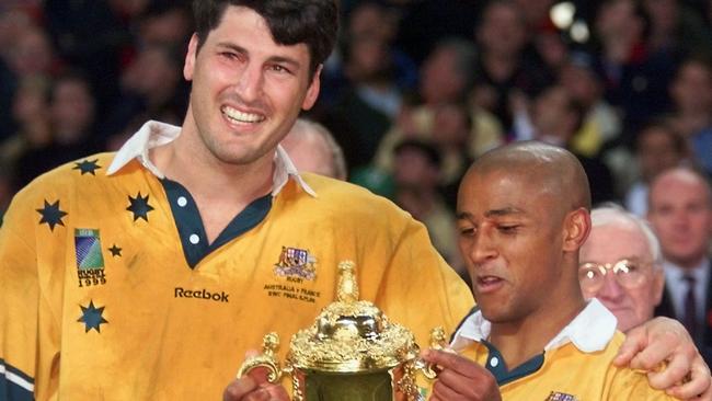 John Eales and George Gregan with Webb Ellis trophy we last won in 1999. Picture: William West/AFP