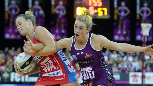 Kim Green and Gabi Simpson in a tight tussle in the grand final.