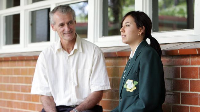 Innisfail State High School Principal Bruce More with Sophia Hamblin-Wang when she won the Order of Australia Association of Student and Citizenship Award in 2005. Photo: Marc McCormack.