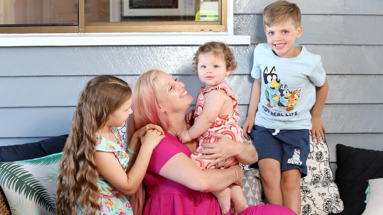 Michelle Dagan with elder daughter Mia, holding Eva and son, Elijah. Photo: Steve Pohlner.