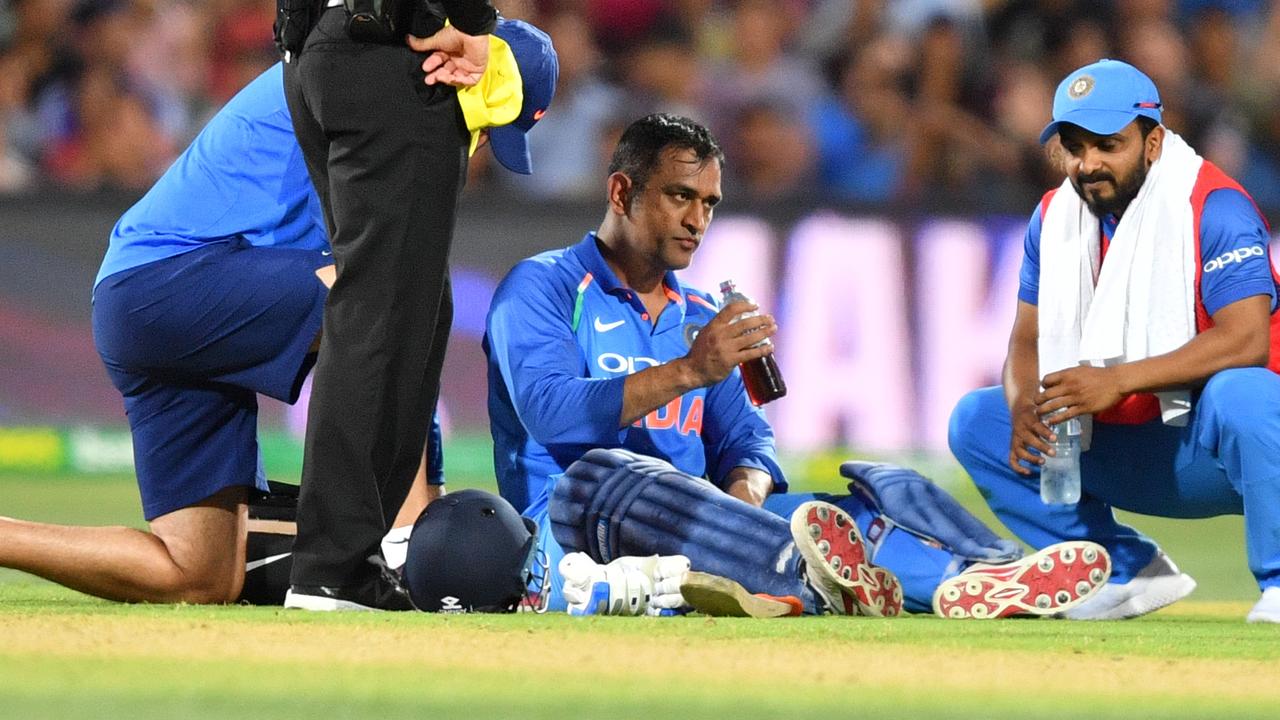 MS Dhoni was brought to his knees by exhaustion, but the veteran took his side to a thrilling final-over win in the second ODI at Adelaide Oval. 