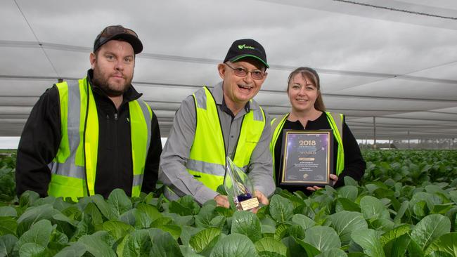 Barden Produce's Shaun Reina, Clem Hodgman and Roslyn Pennings show off the Agriculture and Horticulture production and processing award the business received at the 2018 Lockyer Valley Business Training & Apprenticeship Awards.