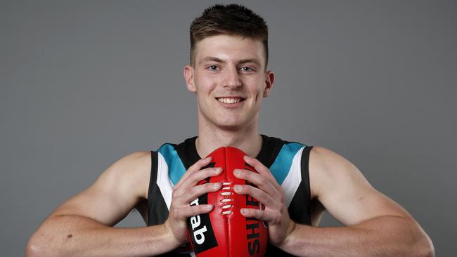 MELBOURNE, AUSTRALIA - NOVEMBER 28: Draft Selection Number 23 Dylan Williams of the Port Adelaide Power poses for a photo during the 2019 NAB AFL Draft at Marvel Stadium on November 28, 2019 in Melbourne, Australia. (Photo by Dylan Burns/AFL Photos via Getty Images)