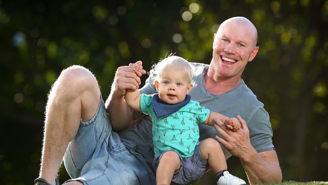 Barry Hall and his son, Miller. The former AFL champion says he and his other son, Houston, have changed his life for the better. Picture: Adam Head