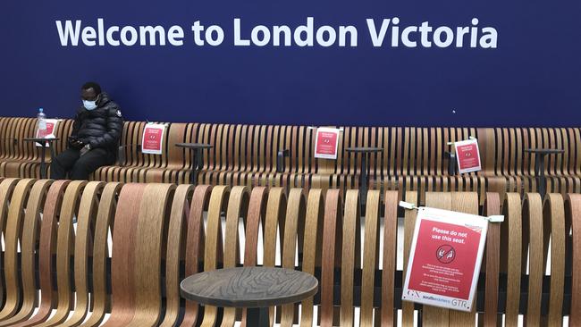 Seats displaying social distancing signs at Victoria Station, London. Picture; AP.