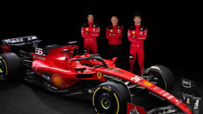 Ferrari's Spanish Formula One driver Carlos Sainz Jr, newly-named Ferrari Formula One team principal, Frederic Vasseur, and Ferrari's Monegasque driver Charles Leclerc.