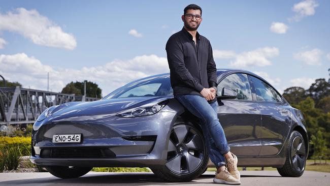 Daksh Juneja pictured with his Tesla that he rents out on new car share app Turo. Picture: Sam Ruttyn