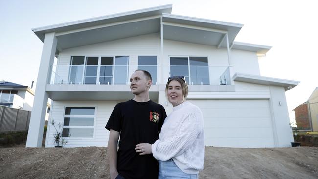 Ashley Hardaker and Deon Joyce bought a block of land with a destroyed home on it in Lake Conjola after the fires ripped through the area. Picture: Sam Ruttyn