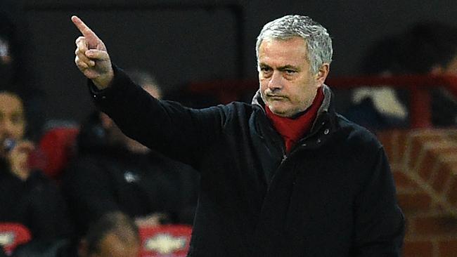 Manchester United's Portuguese manager Jose Mourinho gestures on the touchline during the English Premier League football match between Manchester United and Southampton at Old Trafford in Manchester, north west England, on December 30, 2017. / AFP PHOTO / Oli SCARFF / RESTRICTED TO EDITORIAL USE. No use with unauthorized audio, video, data, fixture lists, club/league logos or 'live' services. Online in-match use limited to 75 images, no video emulation. No use in betting, games or single club/league/player publications.  /