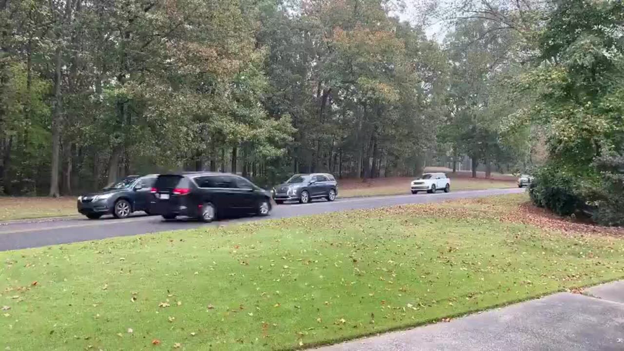 Line of Cars Snakes Into Parking Lot of Alabama Polling Station