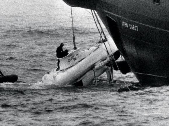 The survivor of a submarine that sank half a century ago has described his experience of being trapped underwater and rescued just 12 minutes before his oxygen ran out.