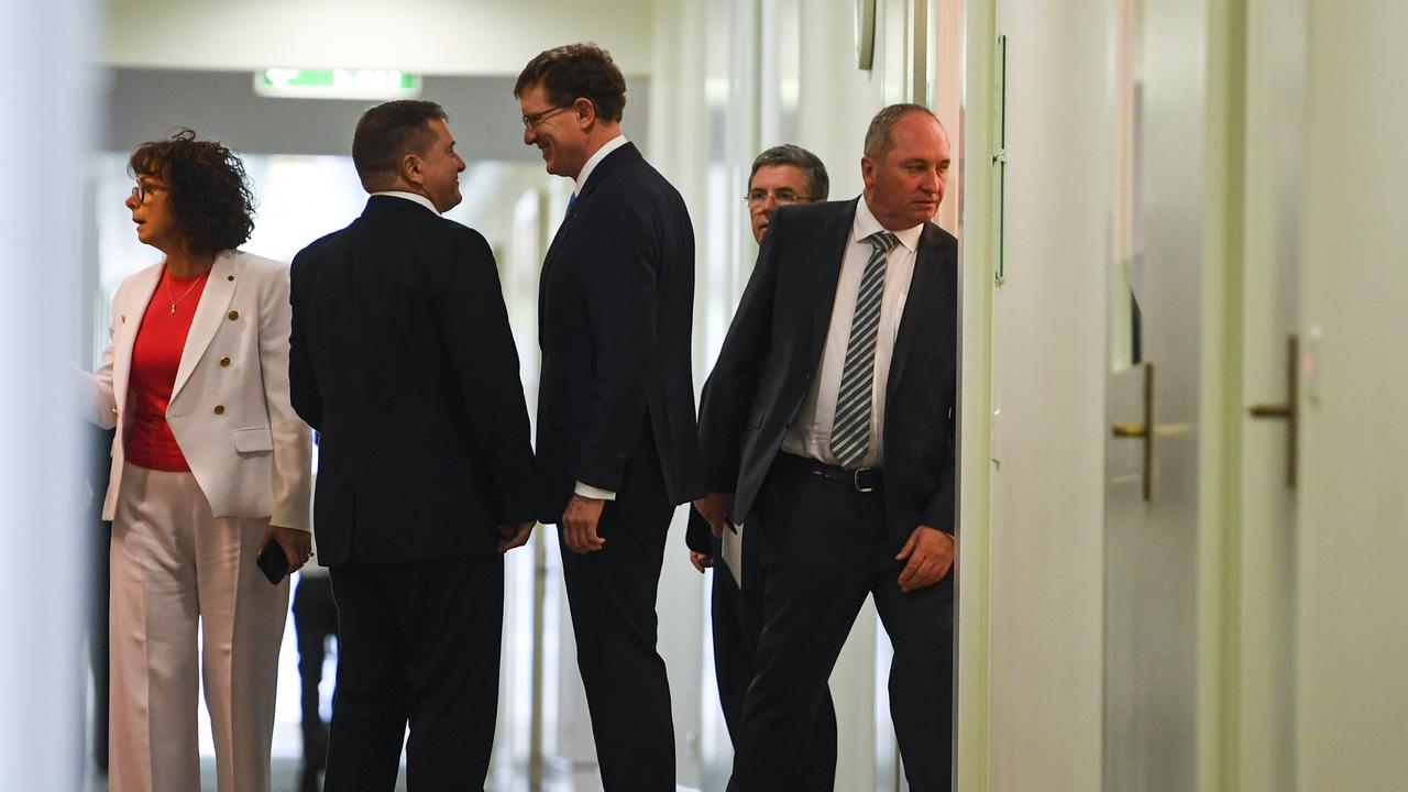 Nationals MP Barnaby Joyce (right) is seen after a Nationals party leadership spill at Parliament House. Picture: Lukas Coch/AAP