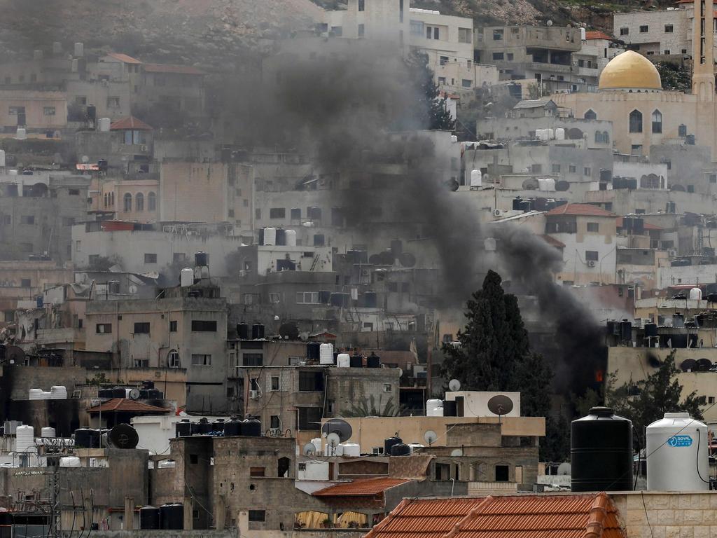 Smoke billows after an explosion over the Jenin camp for Palestinian refugees in the occupied West Bank during an Israeli raid on February 24, 2025. Picture: AFP