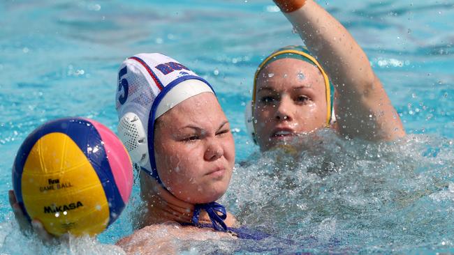 Maria Borisova being guarded by an Australian in their water polo clash.