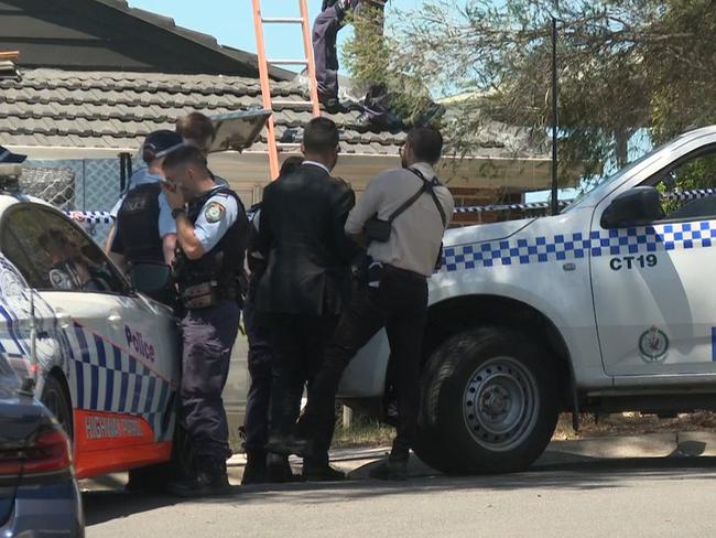 Rescue NSW personnel gained access to the man by removing tiles from the roof but he was already deceased. Picture: TNV