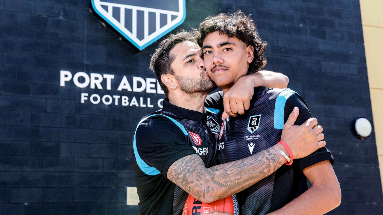 Port Adelaide father-son recruit Jase Burgoyne with dad, Power premiership star Peter Burgoyne. Picture: Brenton Edwards