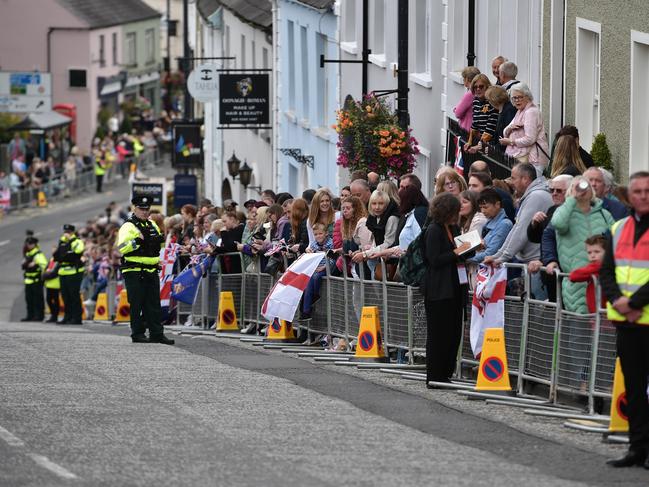 Members of the public line the streets as they wait for King Charles III and Camilla, Queen Consort to arrive at Hillsborough Castle. Picture: Getty