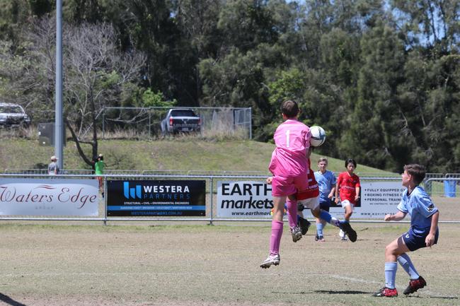 The Premier Invitational football tournament on the Gold Coast. Gold Coast Knights Red v Springfield United under-13s in action. Picture: Mike Batterham.
