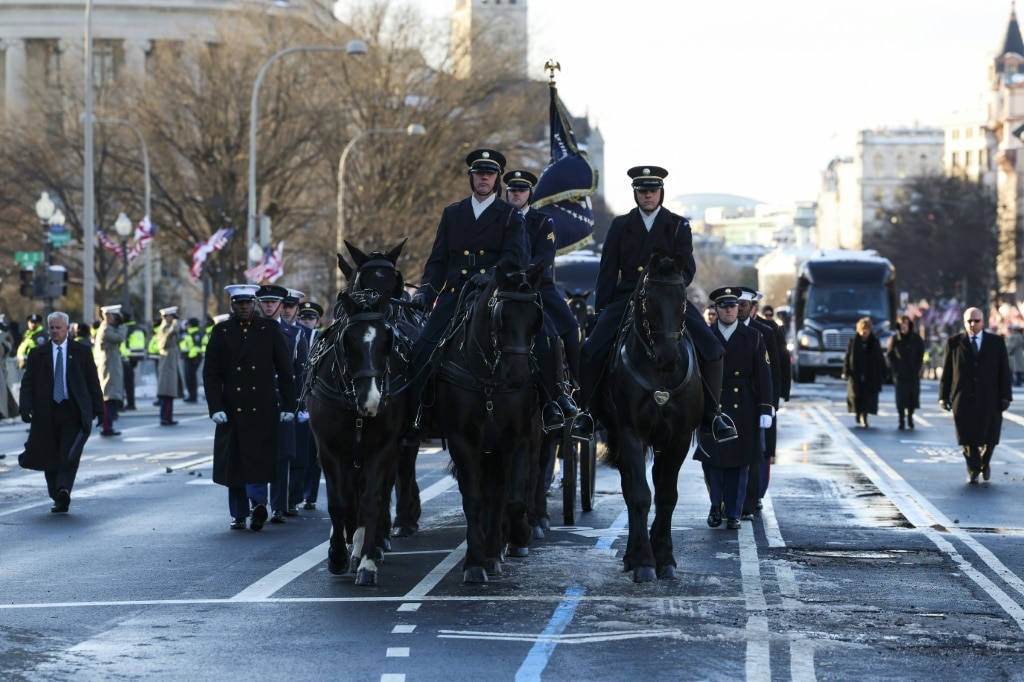 Former US president Carter lies in state after somber Washington procession