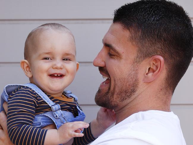 SUNDAY TELEGRAPH - 19/9/19*** MUST NOT PUBLISH BEFORE CLEARING WITH ST PIC ED JEFF DARMANIN ***NRL player Mitchell Allgood with his son Jude at their home today. Jude had cranial surgery 8 weeks ago and is making a great recovery. Picture: Sam Ruttyn