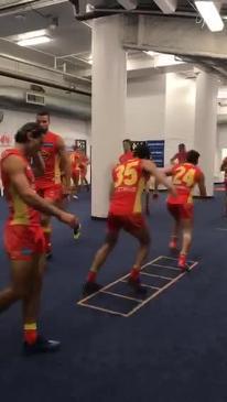 Gold Coast Suns warm up