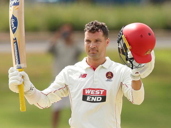 ADELAIDE, AUSTRALIA - MARCH 16: Alex Carey of South Australia celebrates a century during the Sheffield Shield match between South Australia and Queensland at Karen Rolton Oval, on March 16, 2025, in Adelaide, Australia. (Photo by Maya Thompson/Getty Images)