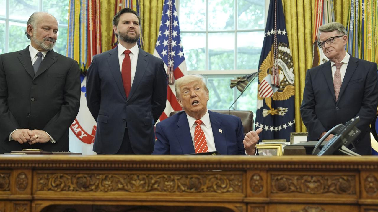 President Donald Trump, centre, with from l-r., Commerce Secretary Howard Lutnick, Vice President JD Vance, and Britain's 's ambassador to the United States Peter Mandelson, making remarks on a trade deal between U.S. and U.K. in the Oval Office of the White House. (AP Photo/Evan Vucci)