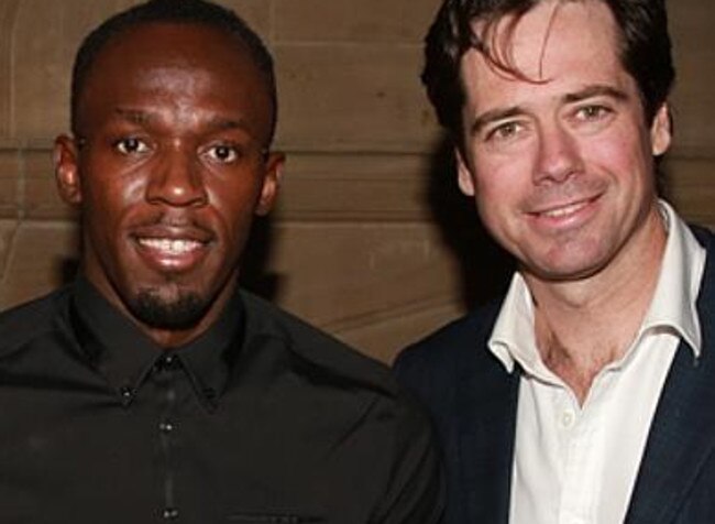 Jonathan Brown, Usain Bolt and Gillon McLachlan. Picture: Anthony Licuria