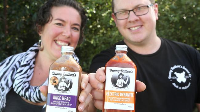 Natalie Harris and Dan Verbi with their Danny Balboa's award-winning sauces. Picture: Hamish Blair