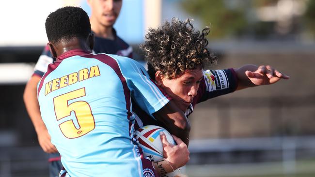 Round 3 of the Langer Reserves - Junior Moliga tackled by Keebras Mungu Barawini. Picture Glenn Hampson