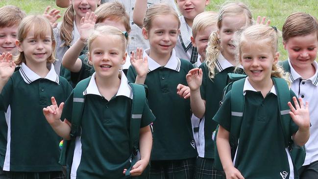 Nine sets of twins  and one set of triplets, lead by Prep students Madelyn and Chloe Boston 4, enrolled at St VincentÃs Primary School at Clear Island Waters, ready to head back to school. Picture Glenn hampson